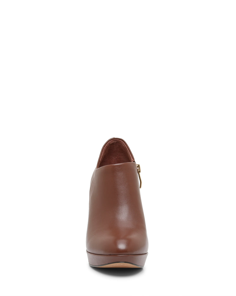 The Vince Camuto Elvin Bootie, a single brown leather ankle bootie with a rounded toe, is shown from the front on a white background.