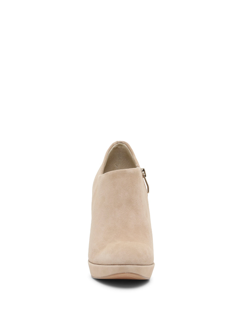 Front view of the Vince Camuto Elvin Bootie in beige suede, featuring a closed toe and a slight platform sole, displayed against a white background.