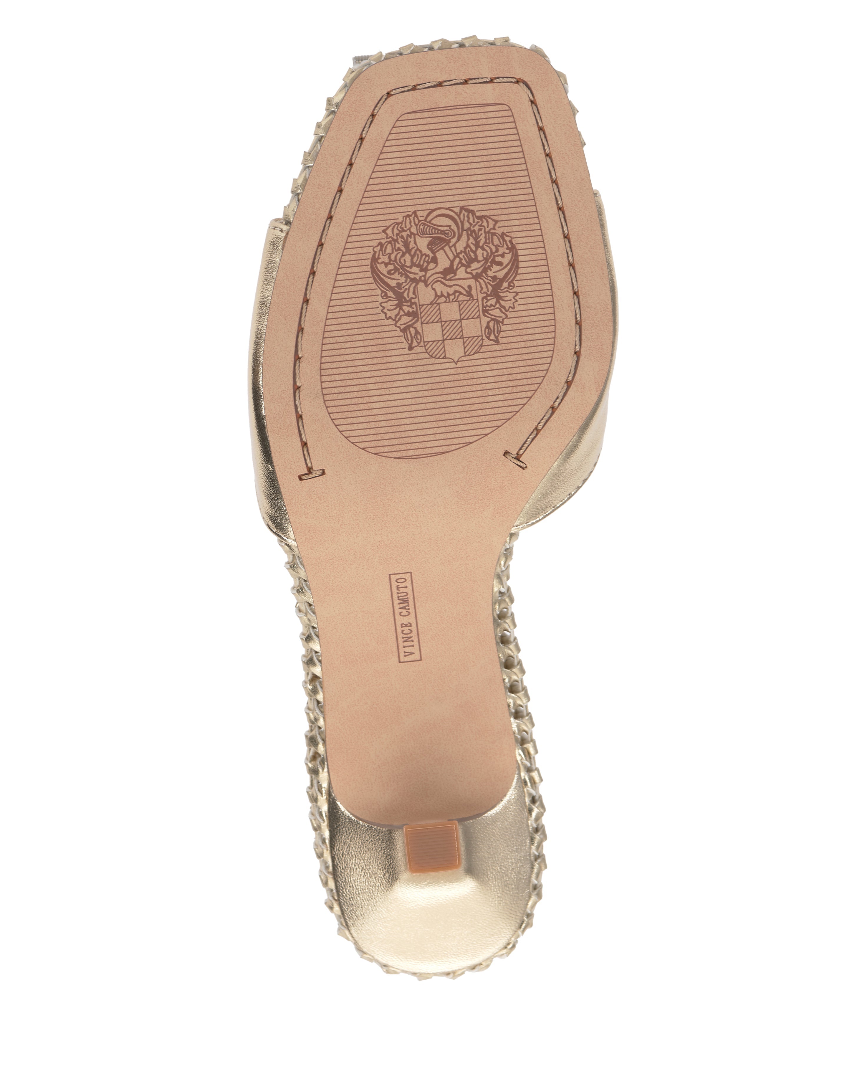 The Emmla Mule by Vince Camuto features a textured-edge sole with a decorative embossed crest and a Made in Italy stamp on the tan underside—a perfect blend of modern elegance.