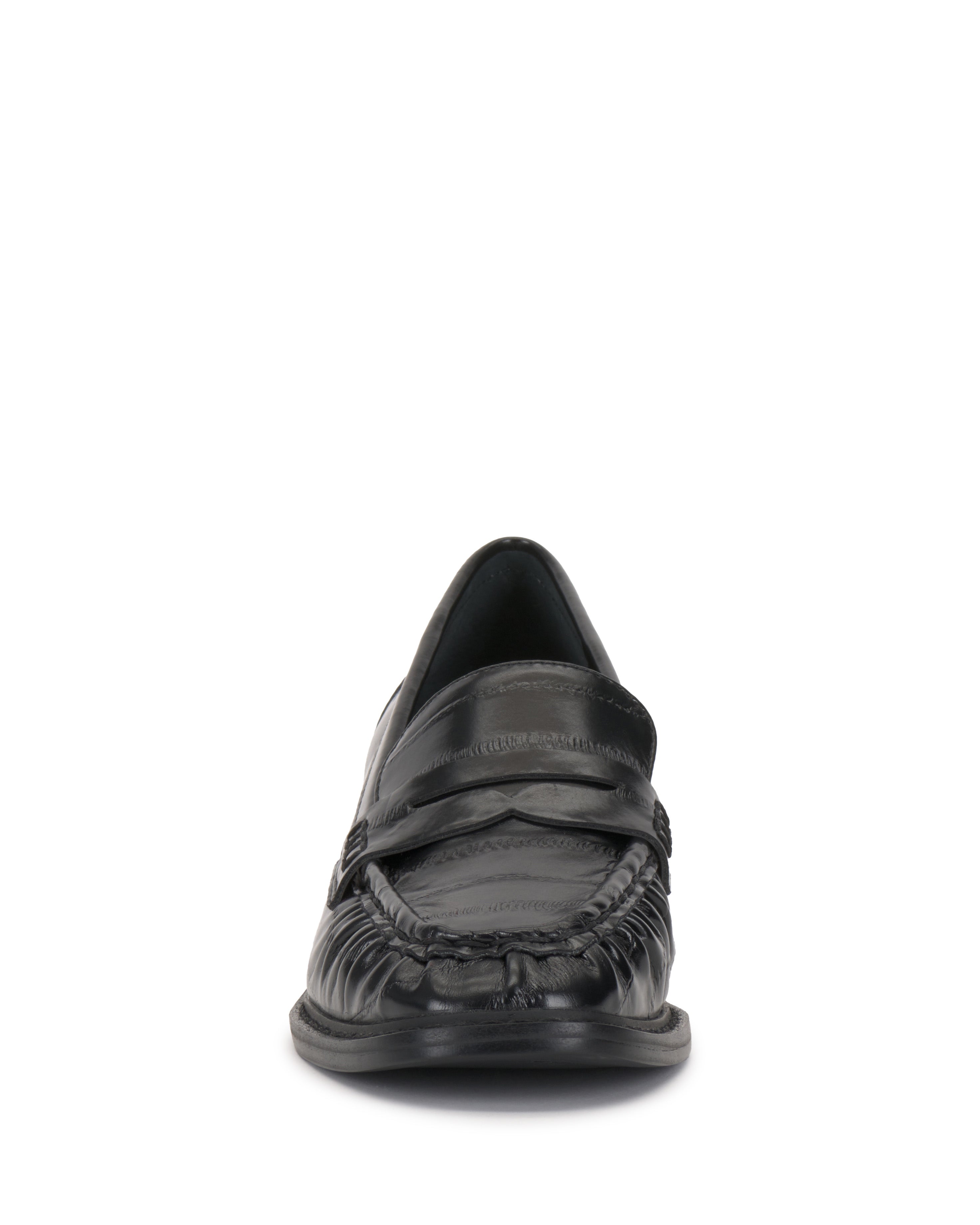 Front view of the Vince Camuto Eshnie Block Heel Loafer in black leather, with detailed toe stitching and a low block heel, displayed against a white background.