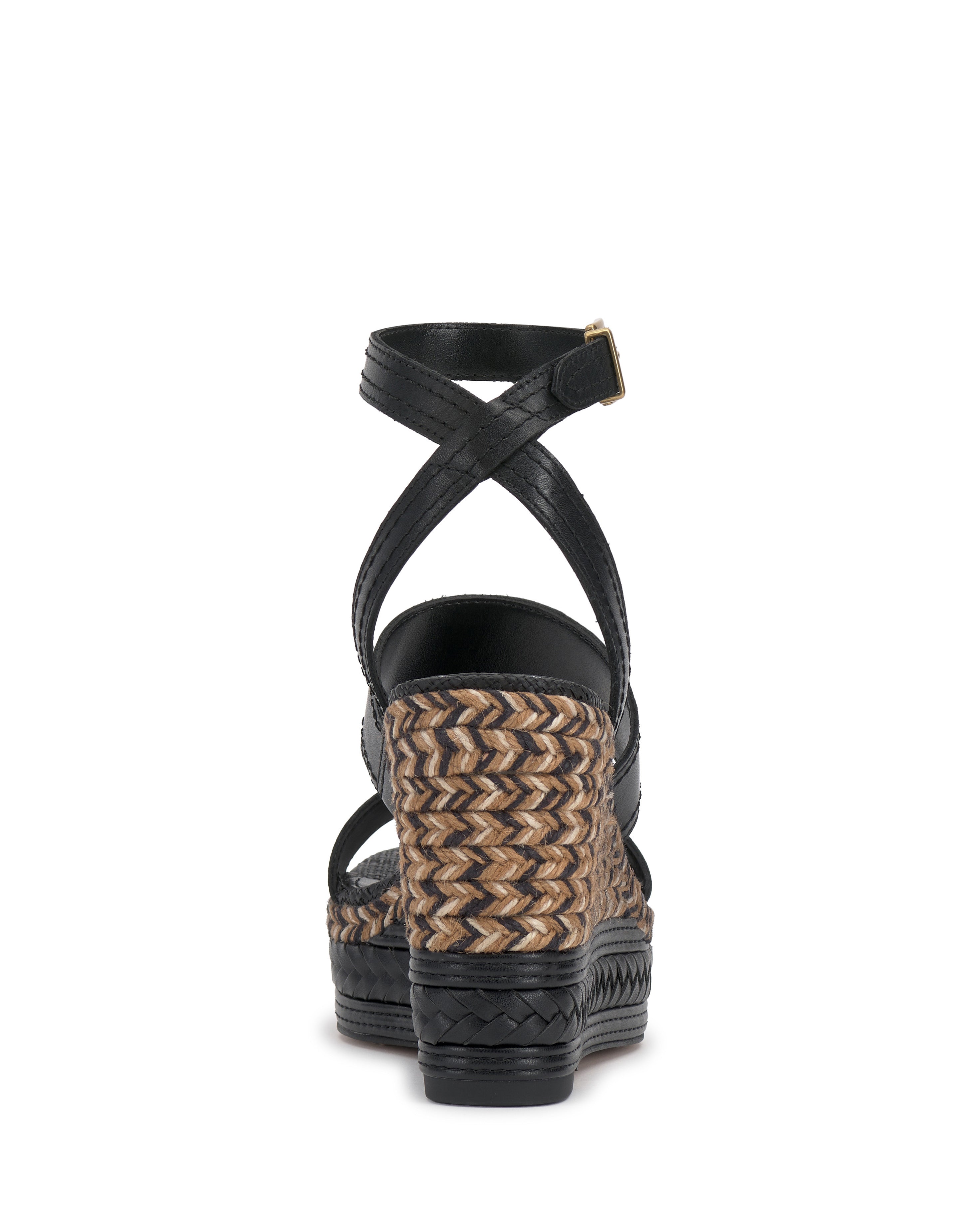 Rear view of the Vince Camuto Esmia Espadrille Wedge Sandal in black, featuring a textured, woven multicolored espadrille heel, braided platform, and strappy ankle with a gold buckle.