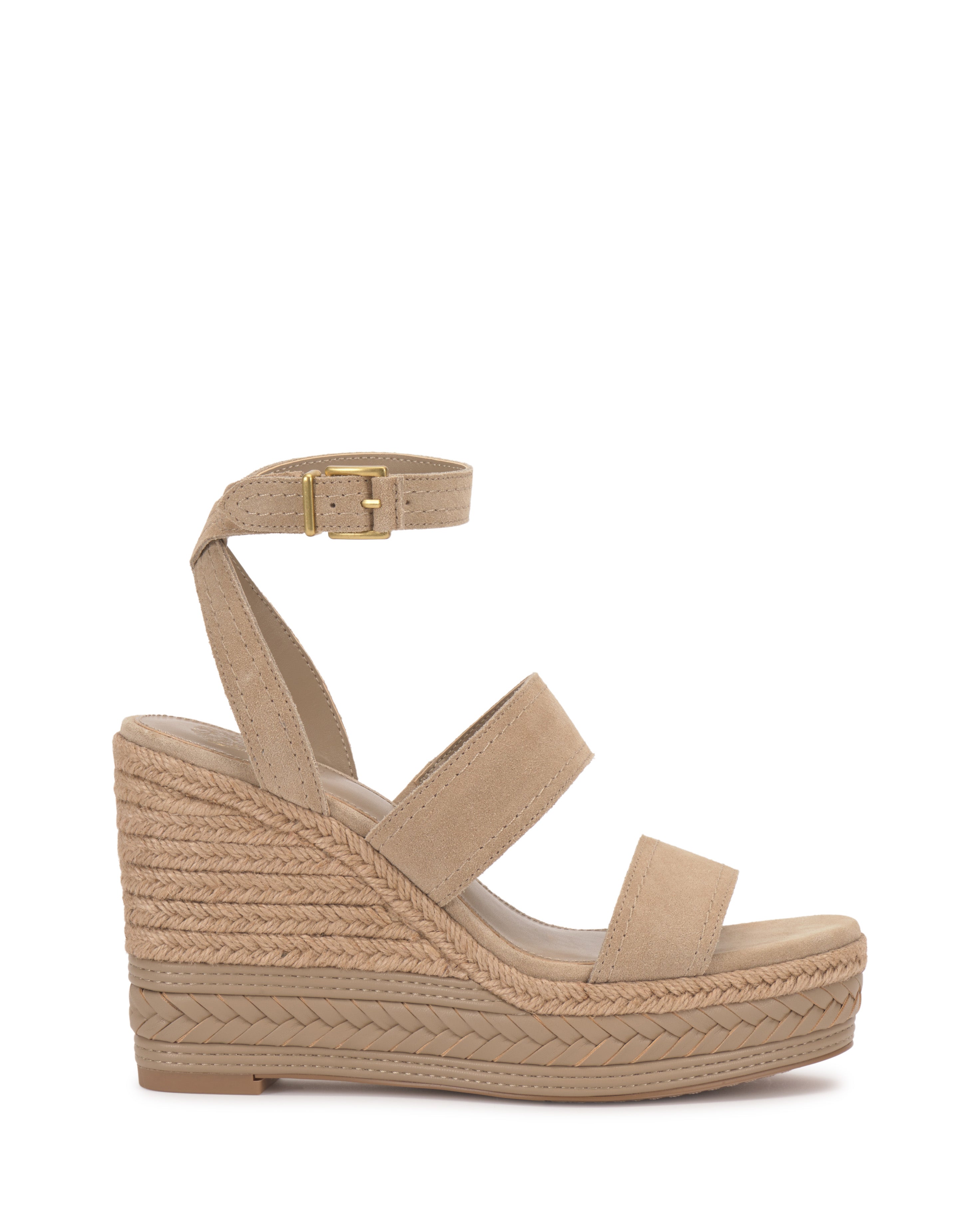 The Esmia Espadrille Wedge Sandal by Vince Camuto features two front straps, a gold-buckled ankle strap, and a braided espadrille heel for a stylish lift.