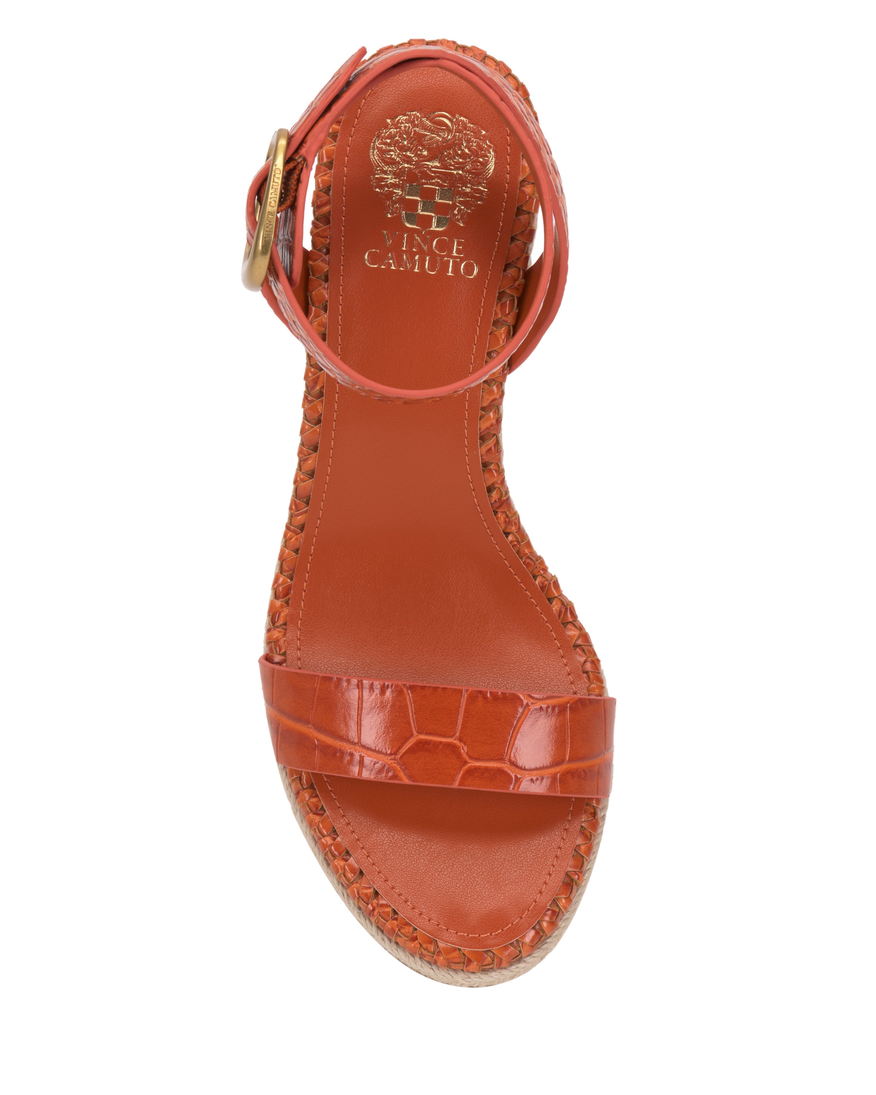 Top view of the Fainel Espadrille Wedge Sandal by Vince Camuto, featuring an orange wedge heel, textured sole, ankle strap with gold buckle, and the Vince Camuto logo in gold on the insole for a perfect summery look.