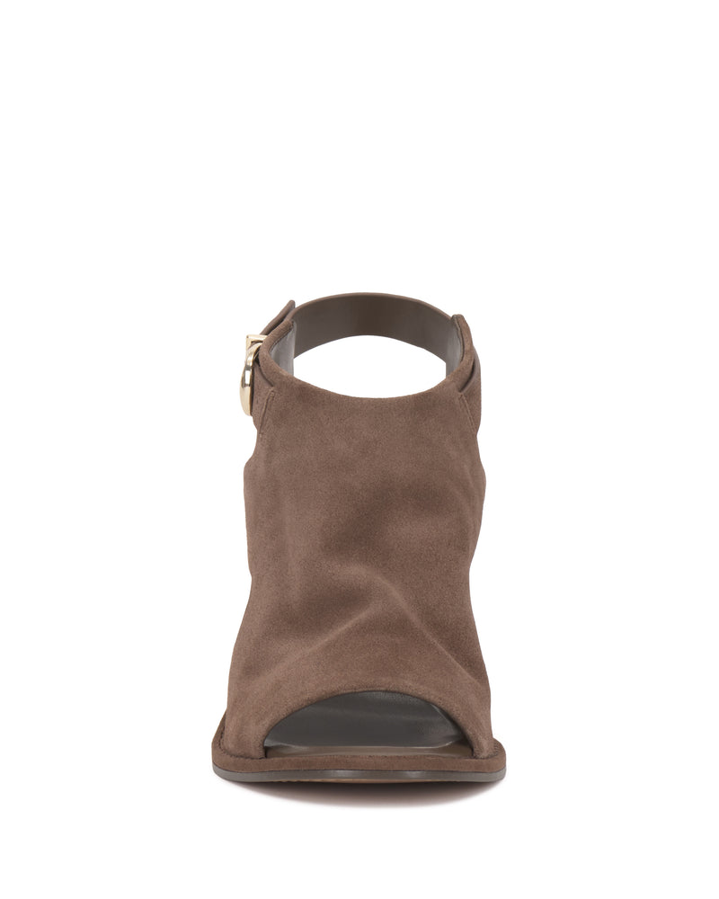 Front view of the Fezisha Sandal by Vince Camuto—a brown suede flat with an open peep toe, ankle strap, side buckle detail, and a relaxed, casual look.