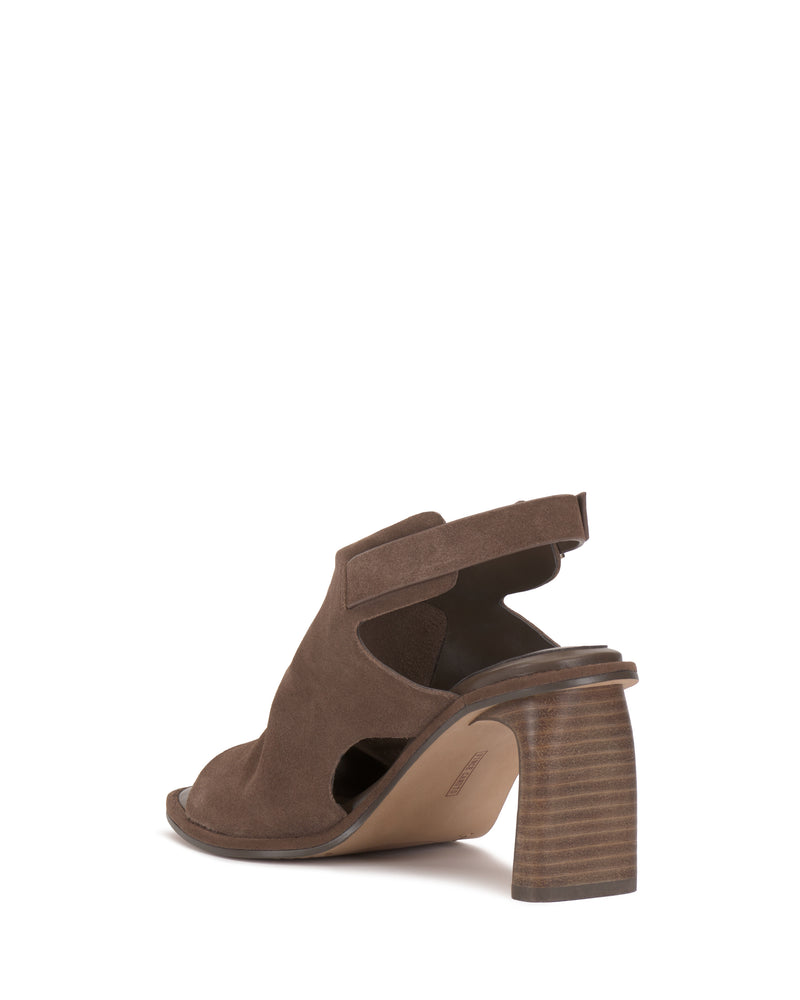 The Fezisha Sandal by Vince Camuto is a brown suede open-toe shoe with a thick stacked heel and Velcro ankle strap, shown from the back on a white background.