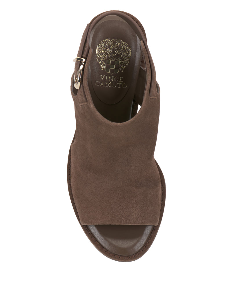 Top view of the Vince Camuto Fezisha Sandal in brown suede with an open toe, side buckle, and Vince Camuto logo and crest on the footbed.
