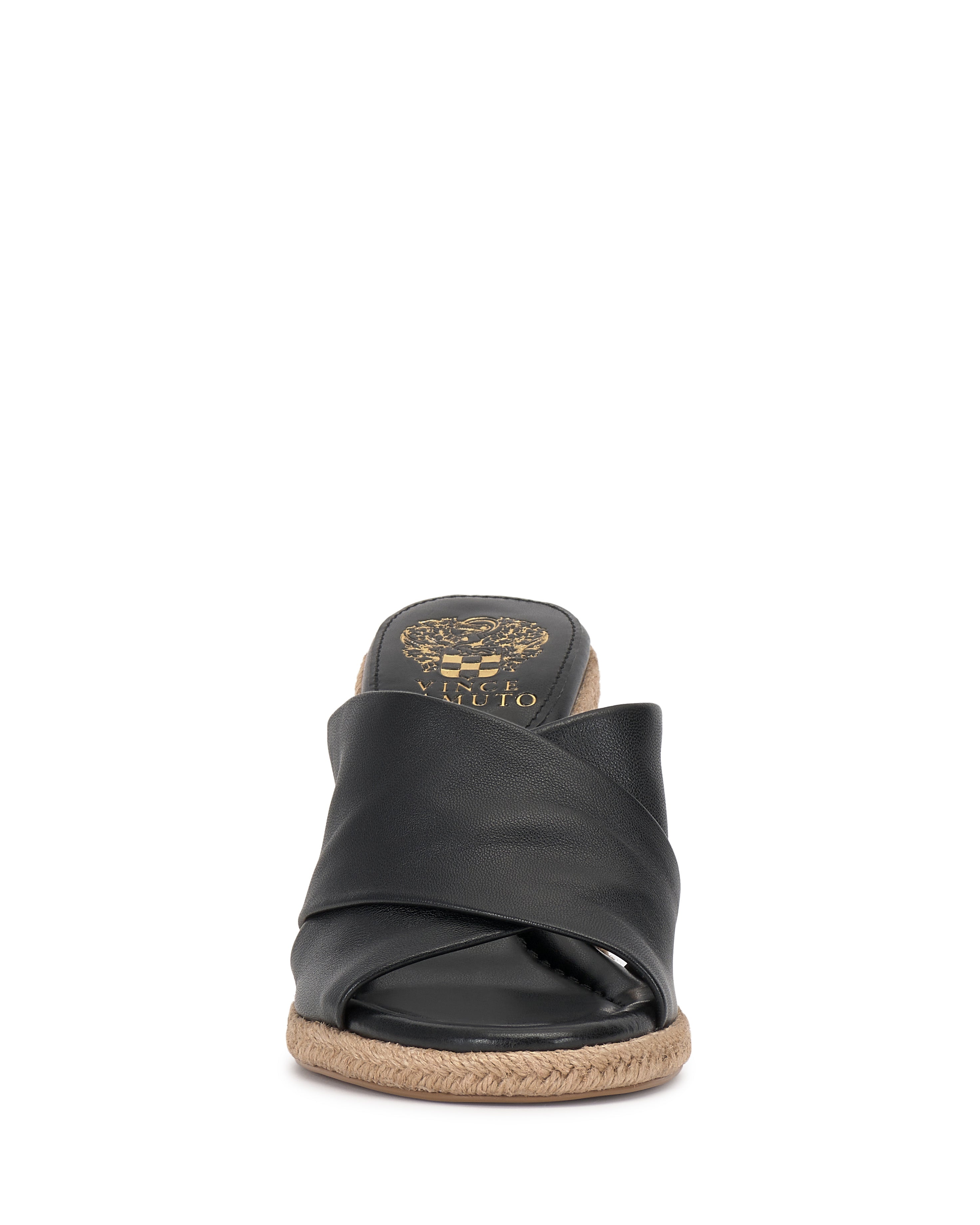 Front view of the Vince Camuto Fisella Espadrille Wedge Sandal in black, featuring crisscross leather straps, a jute-wrapped platform, and a gold logo on the footbed.