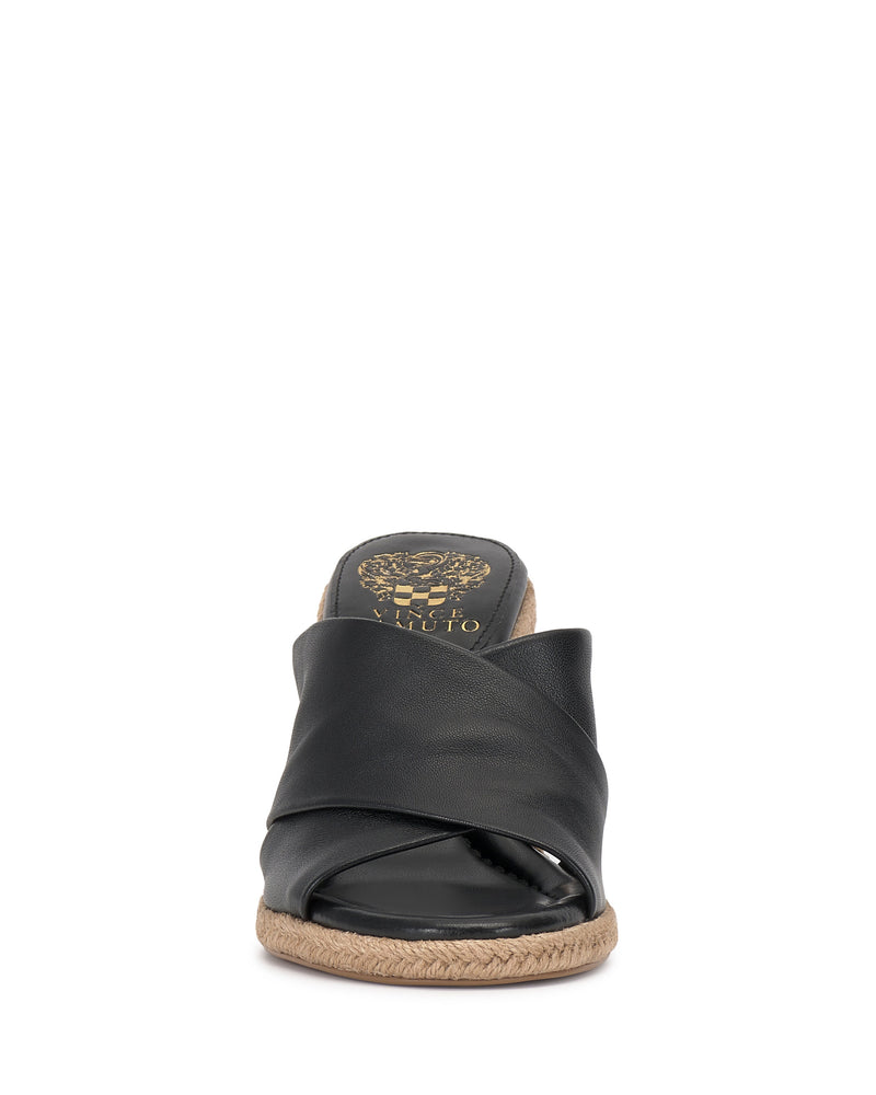 Front view of the Vince Camuto Fisella Espadrille Wedge Sandal in black, featuring crisscross leather straps, a jute-wrapped platform, and a gold logo on the footbed.