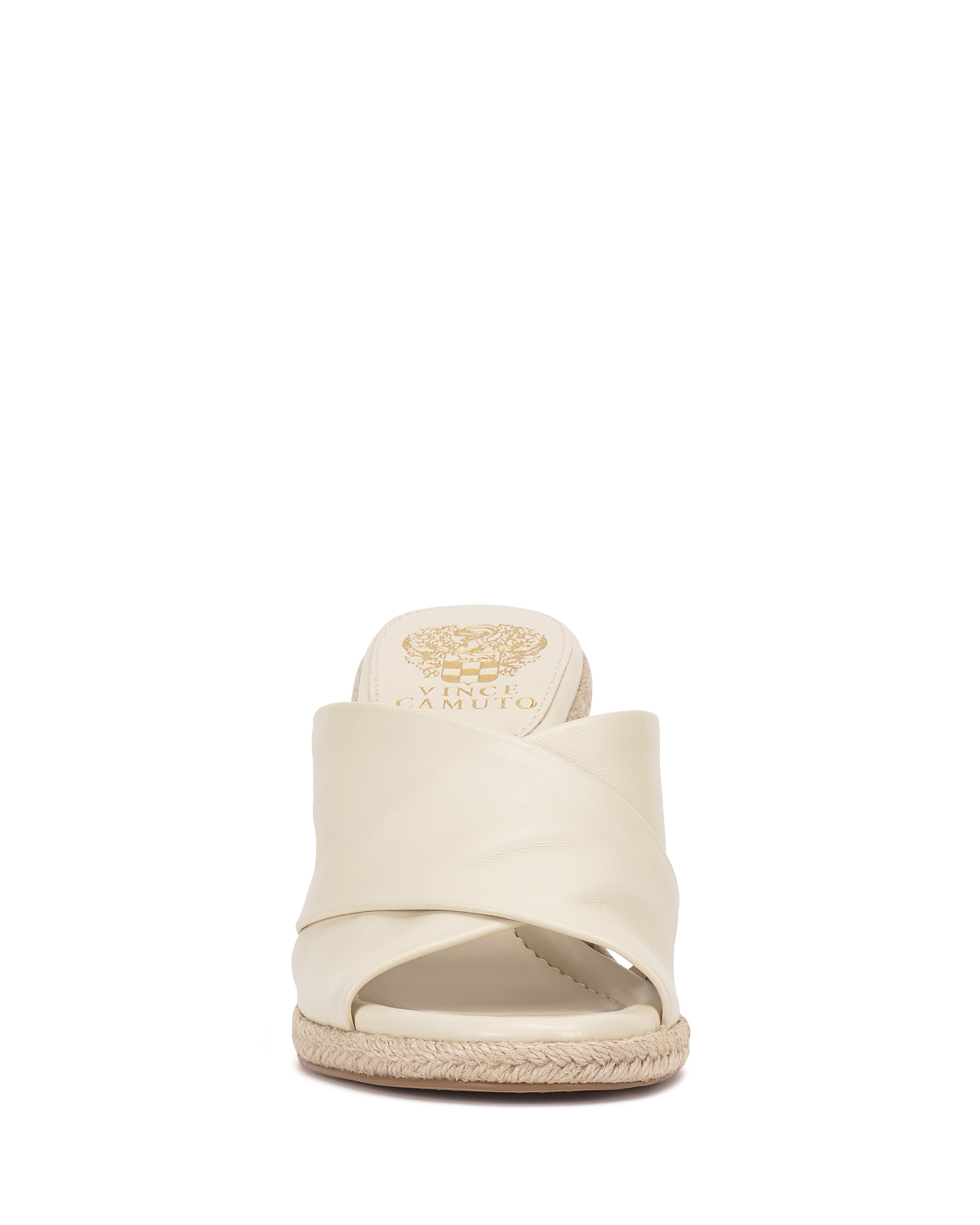 Front view of the Vince Camuto Fisella Espadrille Wedge Sandal, featuring cream-colored crisscross leather straps, an open toe, braided espadrille platform sole, and a convenient slip-on design.