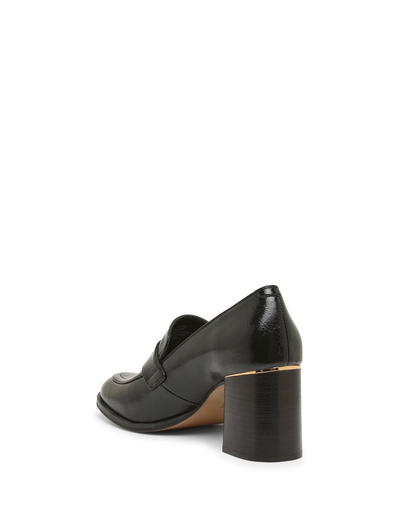 A black Vince Camuto Geanna Pump is positioned with the heel and side facing forward, showcasing its chunky block heel and shiny leather material against a white background.