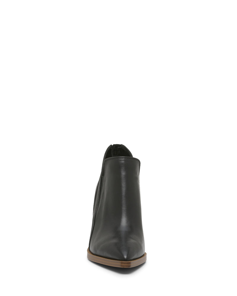Front view of the Gradina Bootie by Vince Camuto, a black leather ankle boot featuring a brown sole and fashionable block heel, positioned upright against a white background—ideal for anyone looking for classic women’s ankle boots or versatile leather booties for women.
