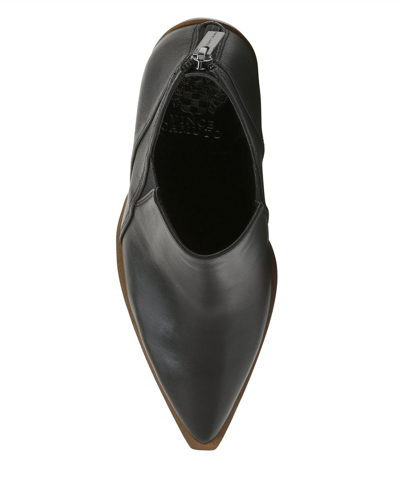 Top view of the Vince Camuto Gradina Bootie—a black leather, pointed-toe shoe featuring a zipper at the heel, set against a white background—an elegant addition to your collection of women’s leather booties.