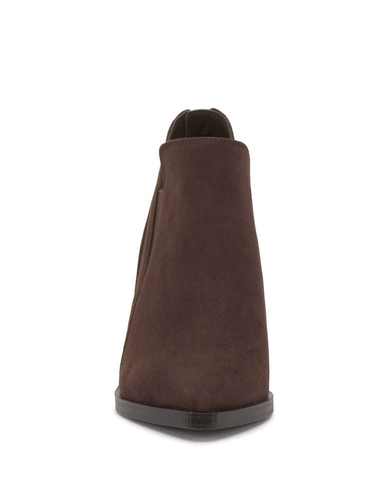 Front view of the Vince Camuto Gradina Bootie in brown suede, featuring a rounded toe and flat sole, photographed on a white background.