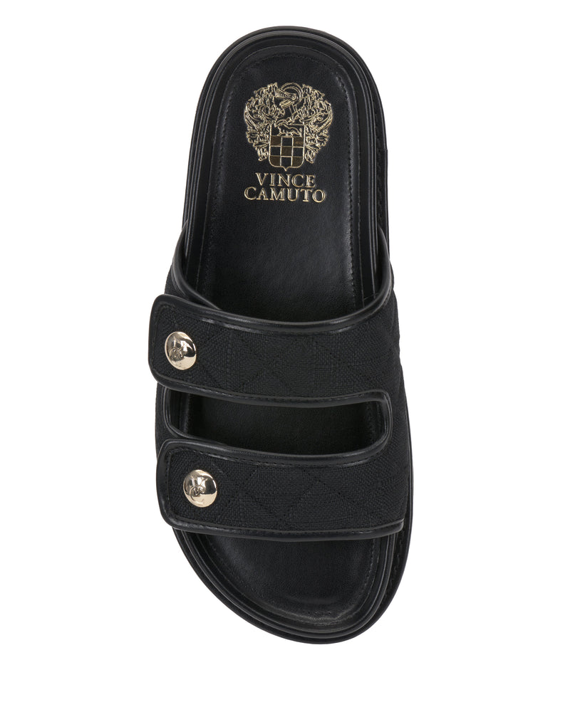 Top view of the Vince Camuto Graysin Slide, a black sandal with double quilted straps, gold-tone buttons, and a gold crest logo on the insole.