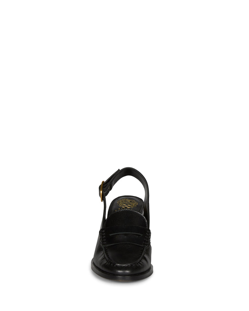 Front view of the Vince Camuto Grinie Loafer in black leather, featuring a closed toe, penny slot detail, ankle strap with a gold buckle, and chunky block heel, set against a plain white background.
