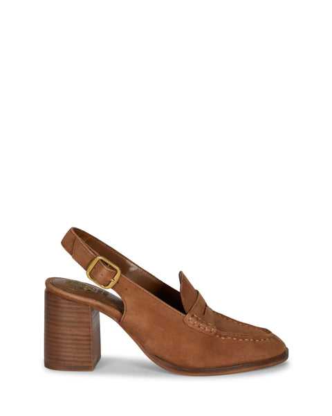 The Vince Camuto Grinie Loafer is a brown suede slingback with a chunky block heel, gold buckle, penny keeper strap, and visible stitching on the loafer-style front, shown in profile against a white background.