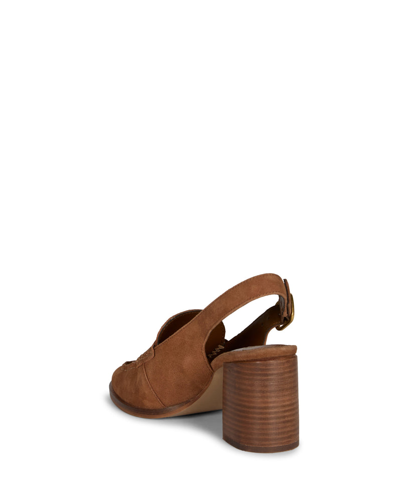 The Grinie Loafer by Vince Camuto is a brown suede slingback with an open back, gold buckle ankle strap, wood-textured chunky block heel, and a design that blends classic comfort with modern flair.