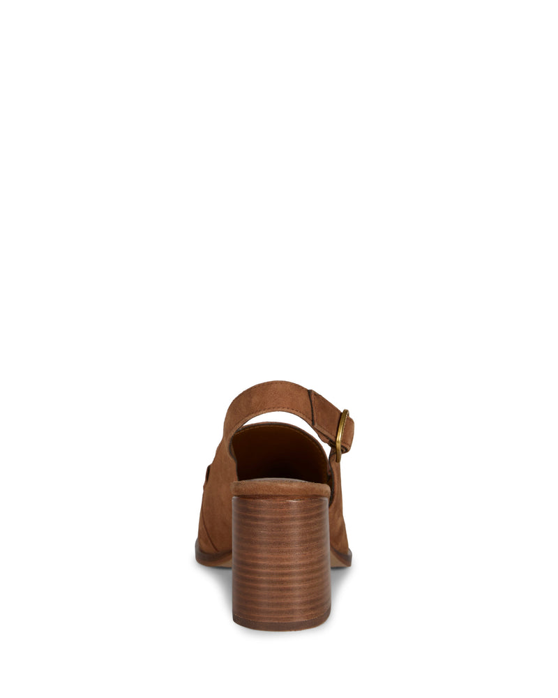 Rear view of the Vince Camuto Grinie Loafer in brown suede, featuring a chunky block heel and ankle strap with a gold buckle, set against a white background.