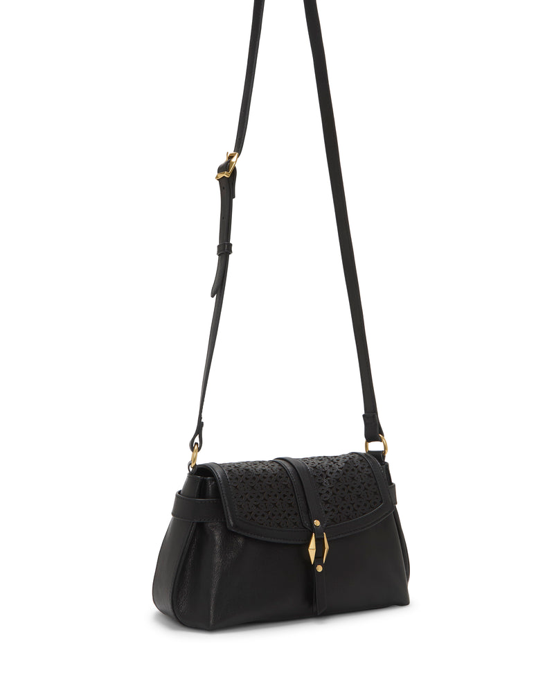 The Hadley Crossbody Bag by Vince Camuto is a black leather shoulder bag featuring a long adjustable strap, gold hardware, a perforated flap closure, and a structured, modern design.