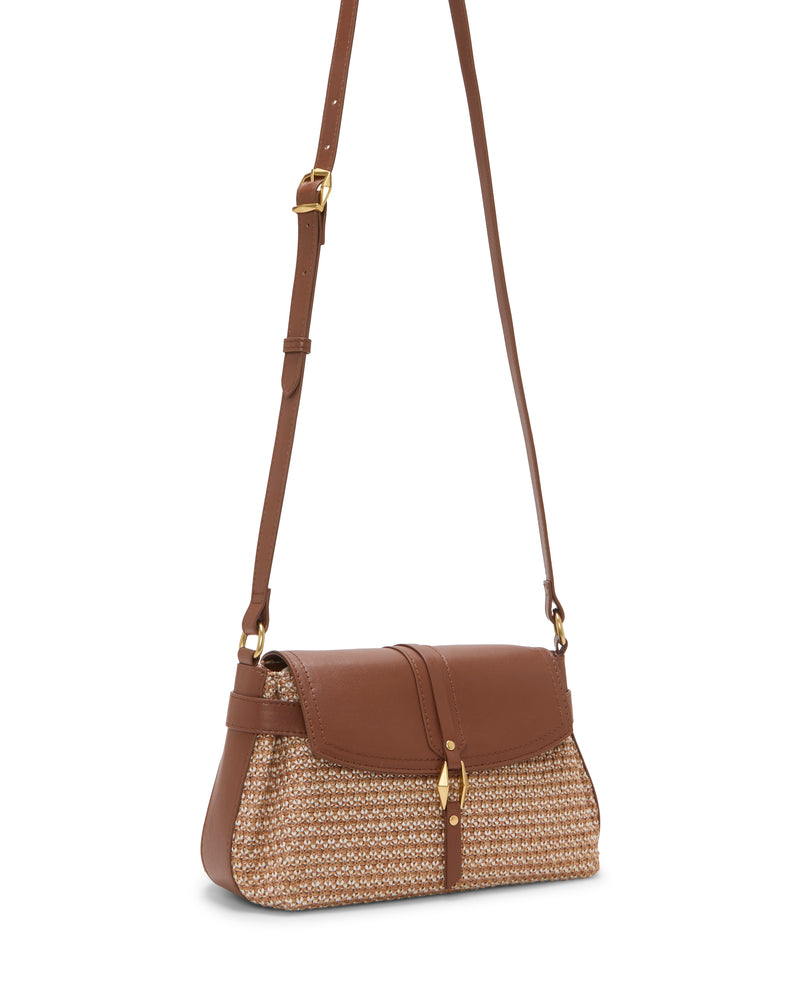 The Vince Camuto Hadley Crossbody Bag features a brown design with an adjustable leather strap, flap closure, gold hardware, and a woven straw-like pattern on the lower half.