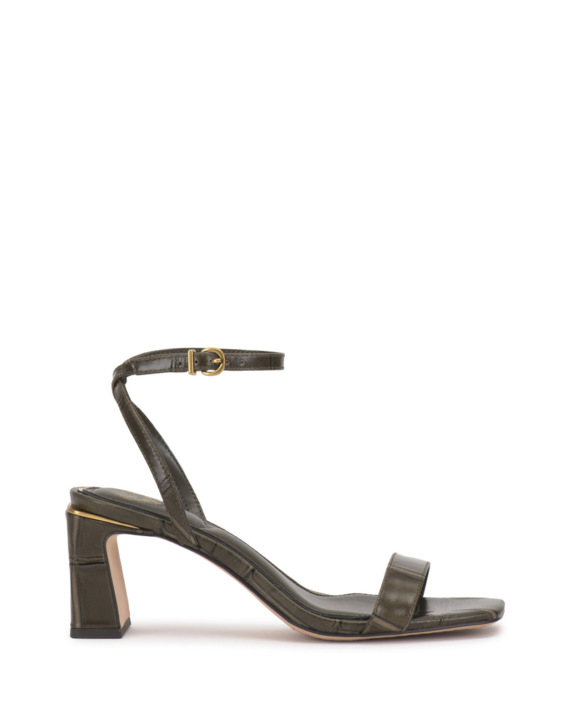 Vince Camuto Hamda sandal in olive green with a block heel, square-toe silhouette, and an adjustable ankle strap with a gold-toned buckle.