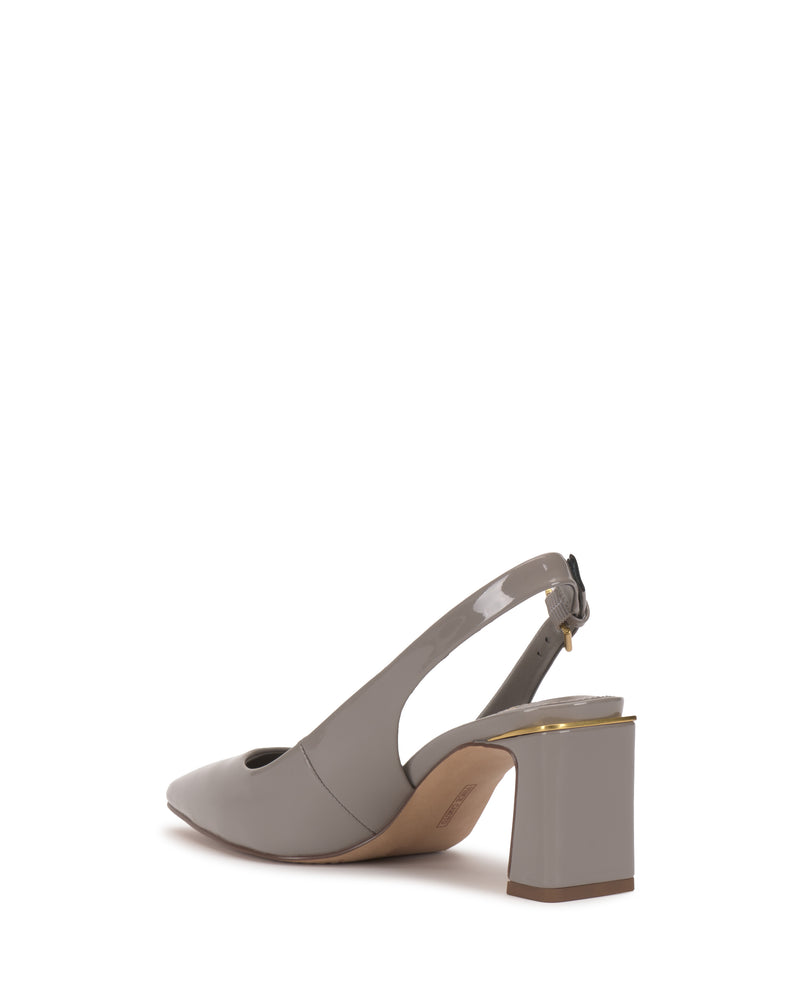 The Vince Camuto Hamden Buckle Slingback, crafted in gray patent leather, features a pointed toe, chunky block heel, adjustable strap, and gold accent detailing along the top edge of the heel. The shoe is photographed against a white background.