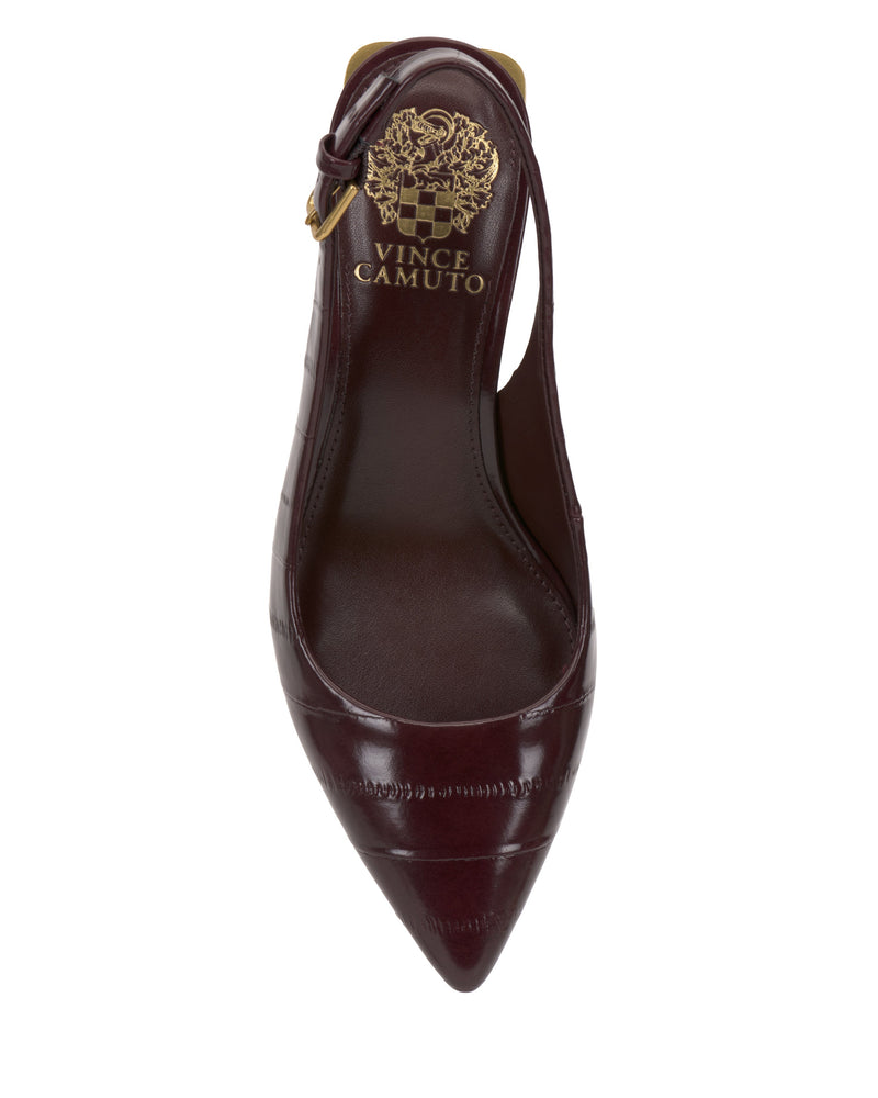 A top view of the Hamden Buckle Slingback by Vince Camuto shows its pointed toe, dark burgundy crocodile-texture finish, chic block heel, gold embossed logo on the insole, and a slim buckle strap.