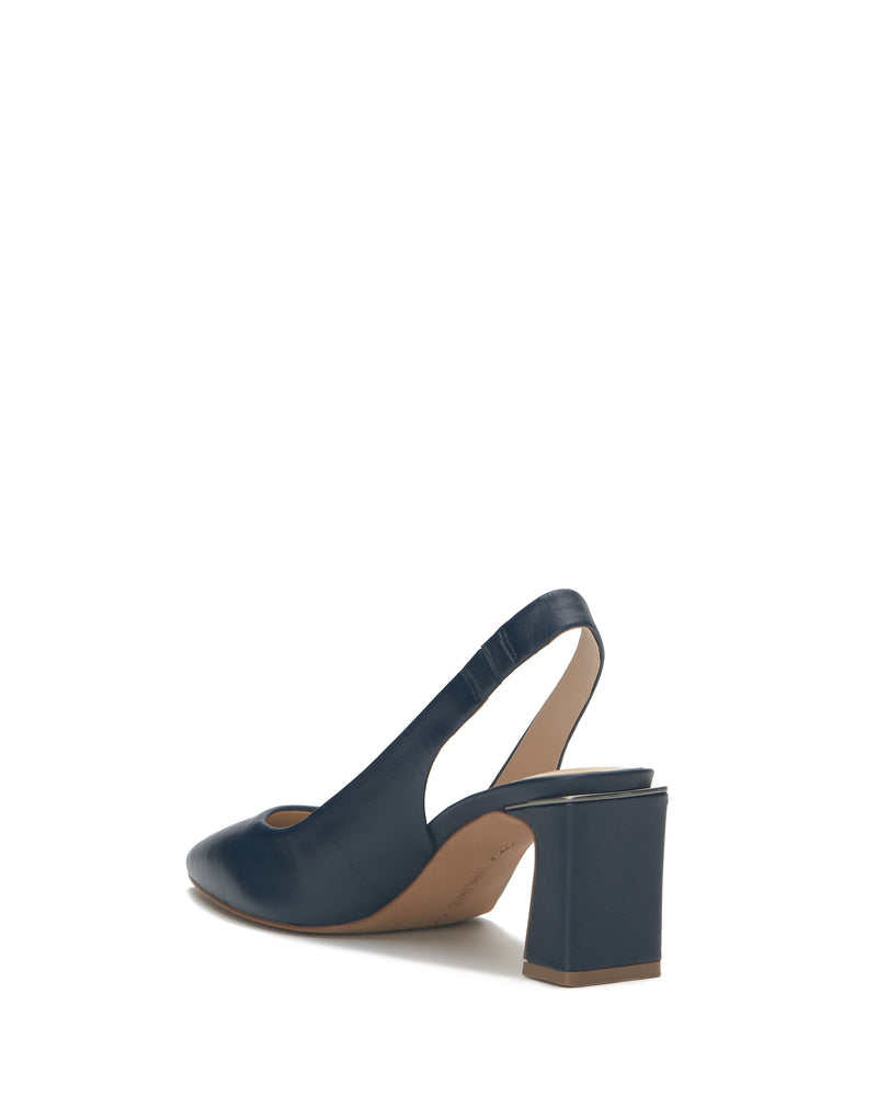 The Vince Camuto Hamden Slingback features navy blue leather, a square block heel, closed toe, and an elasticated back strap, displayed in a three-quarter rear view against a white background.
