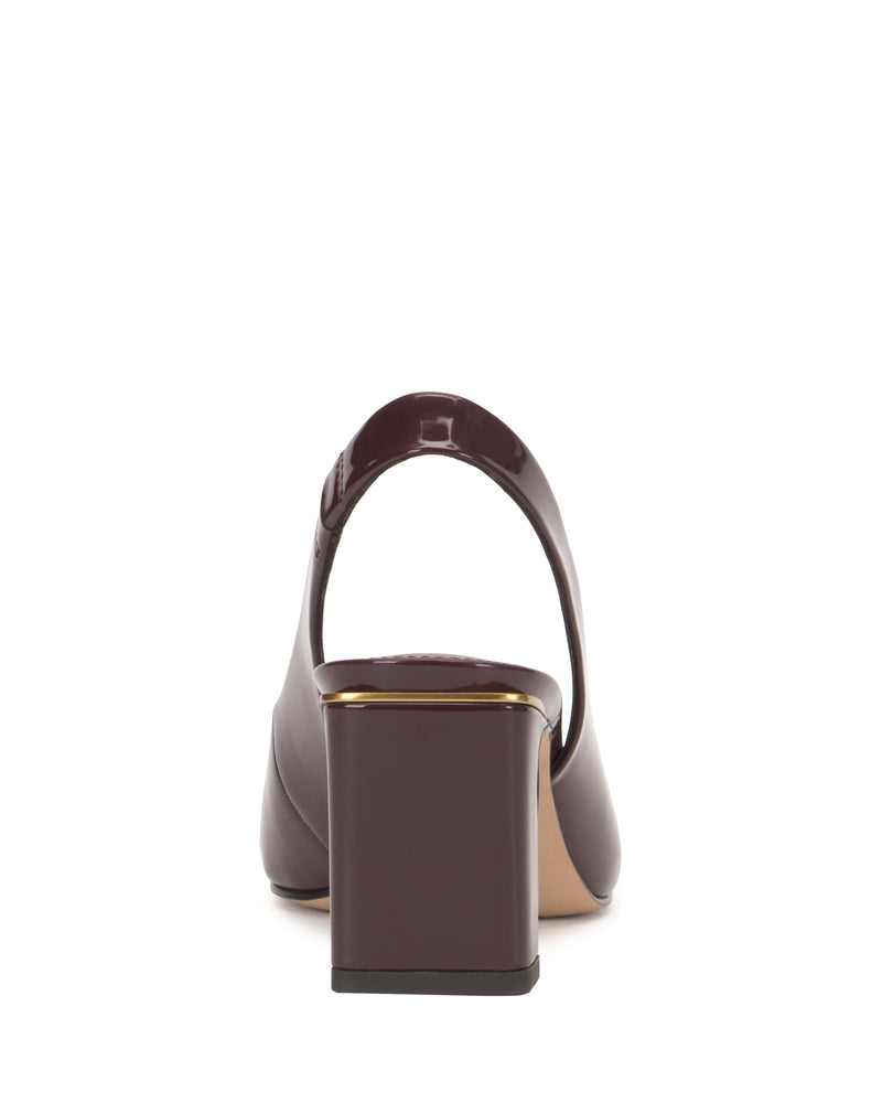 A rear view of the Vince Camuto Hamden Slingback, a single burgundy patent leather point-toe pump featuring a low, chunky heel, gold trim accents, and an elegant slingback strap.