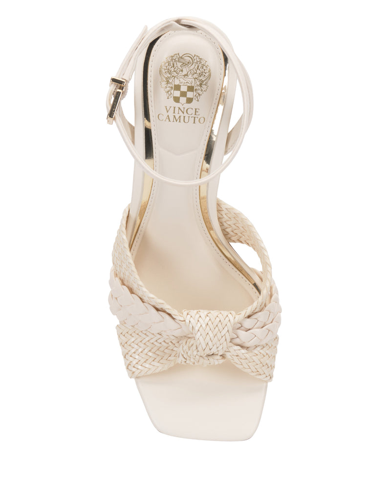 Top view of the Hanlea Sandal by Vince Camuto, showcasing braided strap detail, a stylish square toe, ankle buckle strap, block heel, and a gold Vince Camuto logo on the insole.