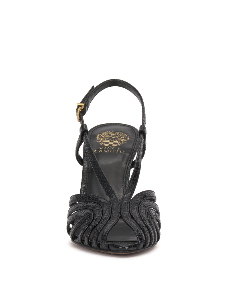 The Vince Camuto Hannie Slingback Sandal features a black open-toe caged design with woven detailing, a slingback strap with gold buckle, and a gold emblem on the insole.
