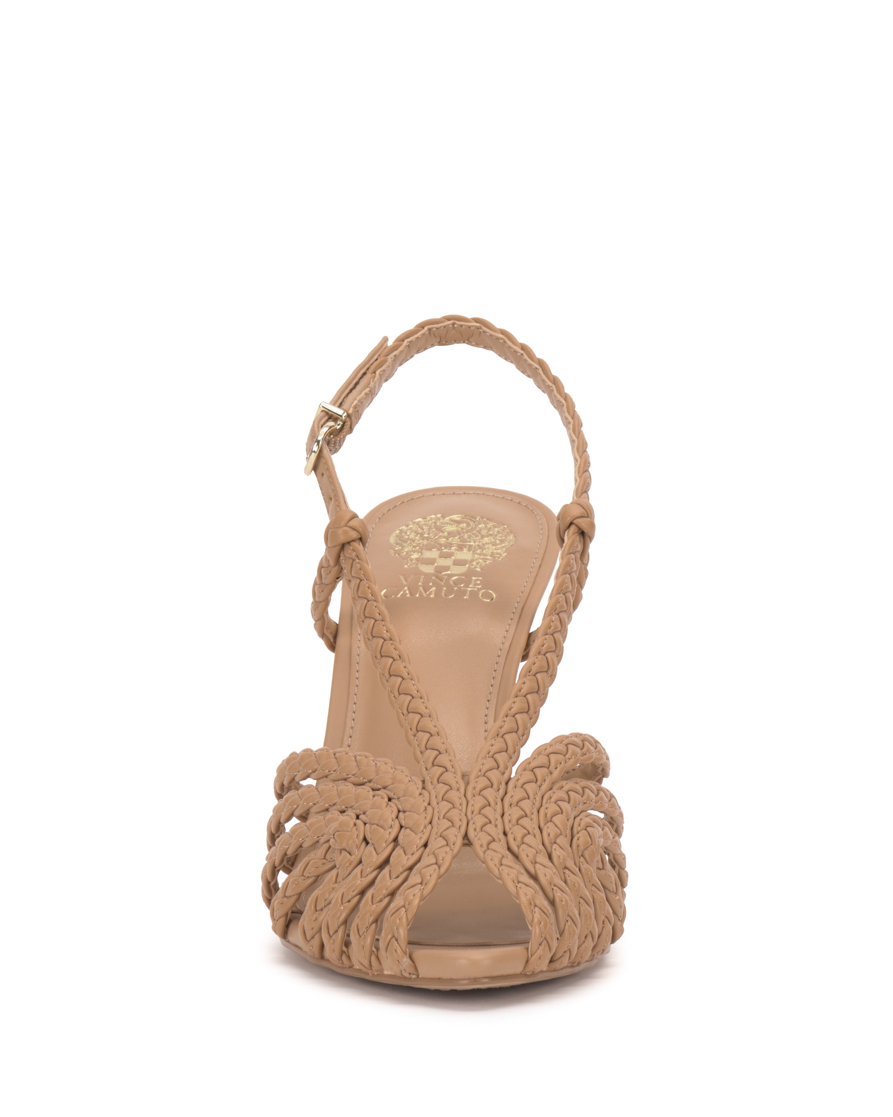 Front view of the Vince Camuto Hannie Slingback Sandal in beige, featuring braided straps, ankle buckle, open toe with caged design, and a gold floral logo on the insole.