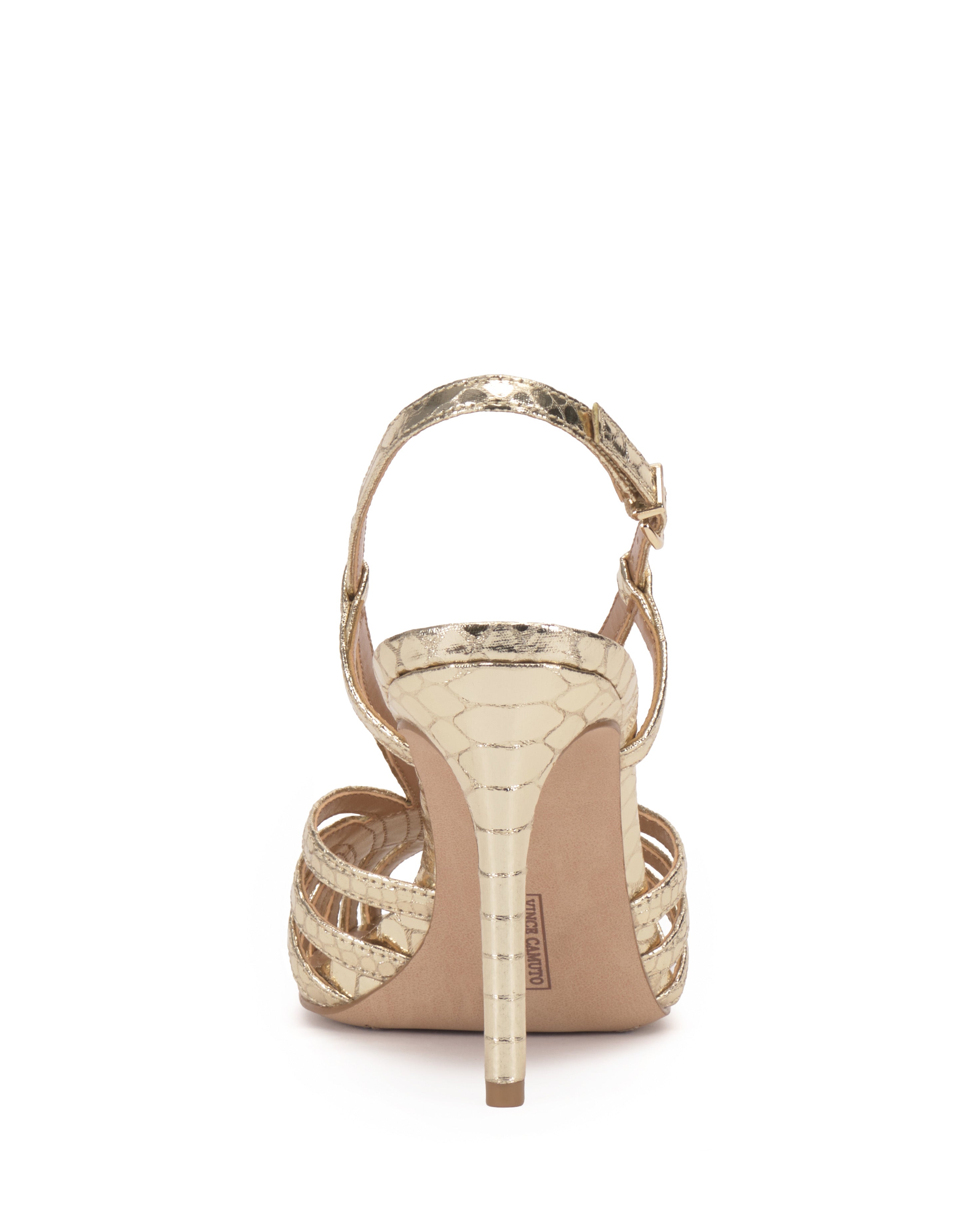 The Vince Camuto Hannie Slingback Sandal in gold features a caged silhouette, textured snake print, ankle strap with buckle, and is shown from the back against a white background.