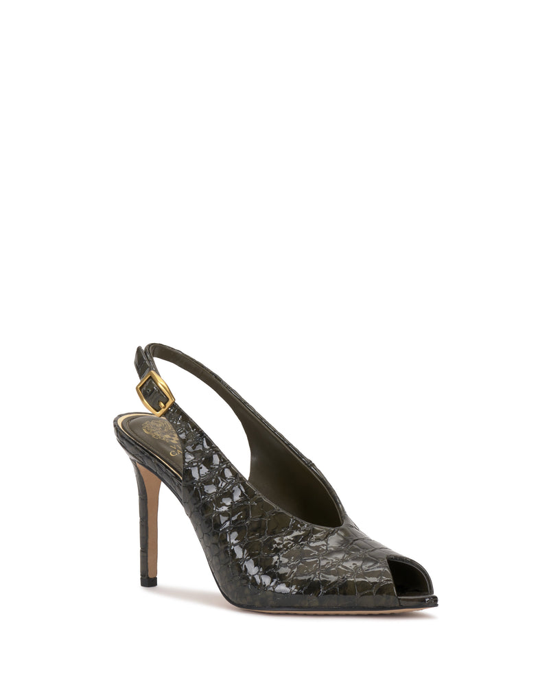 The Vince Camuto Helenza Pump is a dark green, crocodile-textured peep-toe slingback featuring a skinny high heel and a gold buckle strap, showcased against a white background.