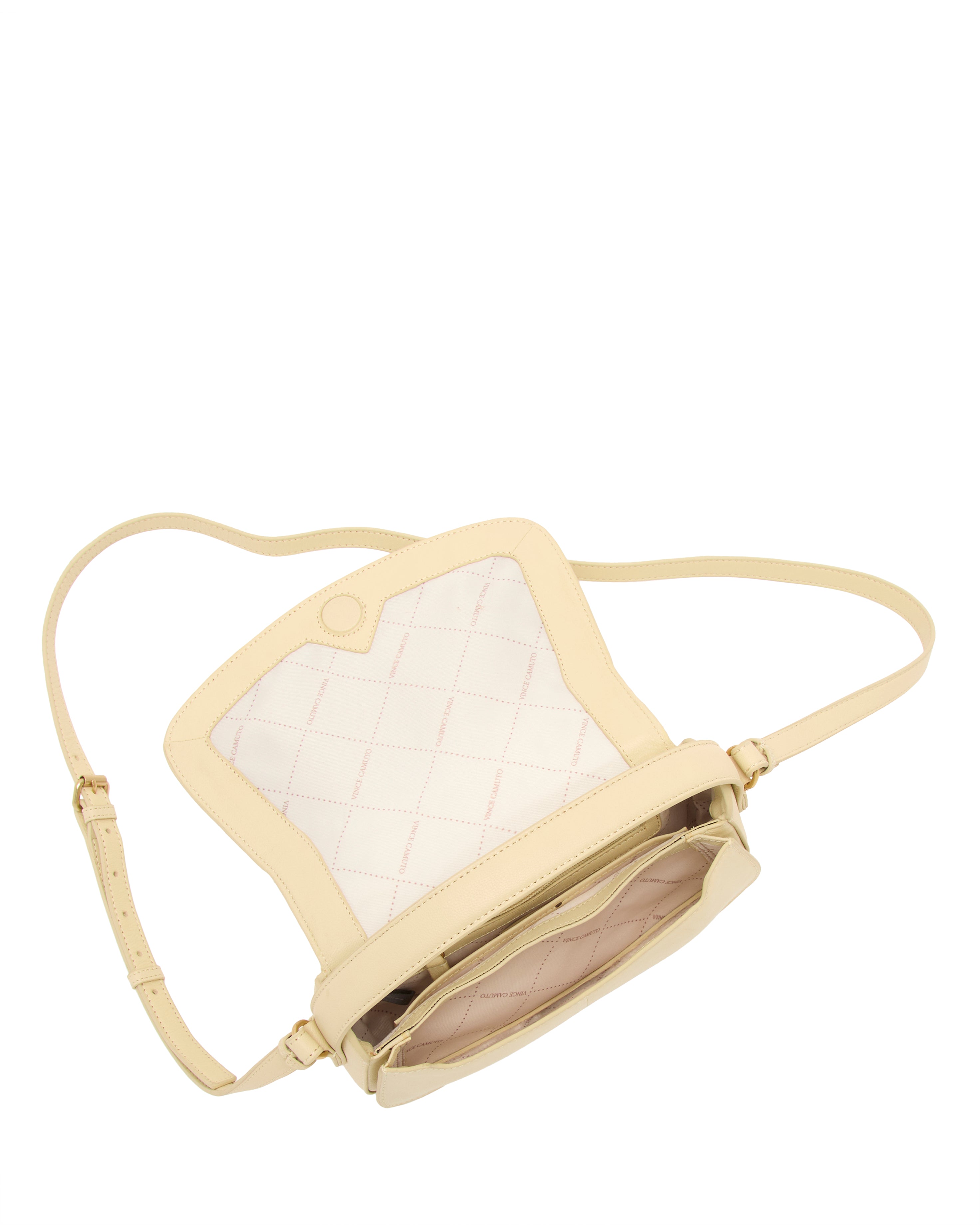 The Vince Camuto Jayda Crossbody Bag features a cream nappa leather exterior, long adjustable strap, quilted interior with compartments, and is displayed against a white background.