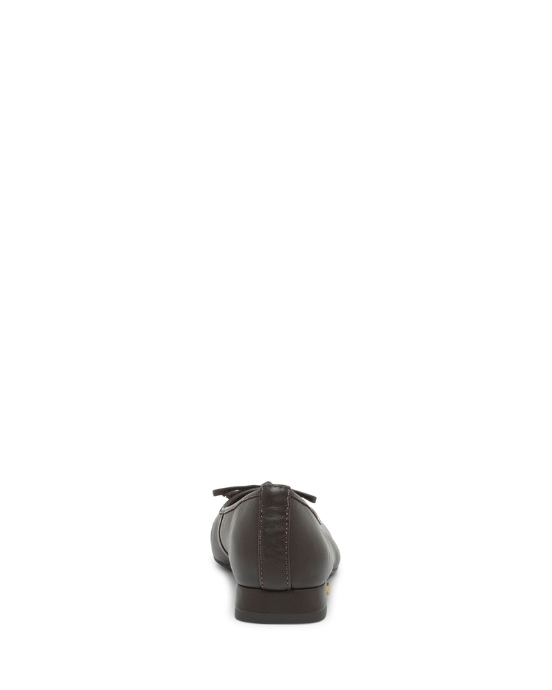 A brown Jenlea Ballet Flat by Vince Camuto, featuring a subtle low block heel, is viewed from the back and centered against a plain white background.