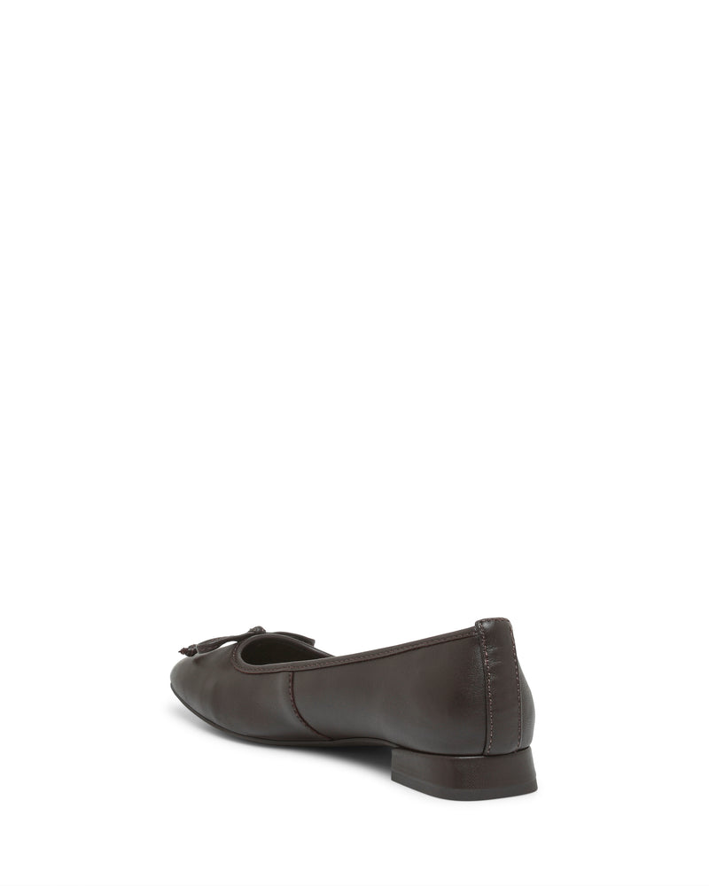 The Vince Camuto Jenlea Ballet Flat, crafted from dark brown leather with a low block heel, is angled toward the back left and displayed on a white background.