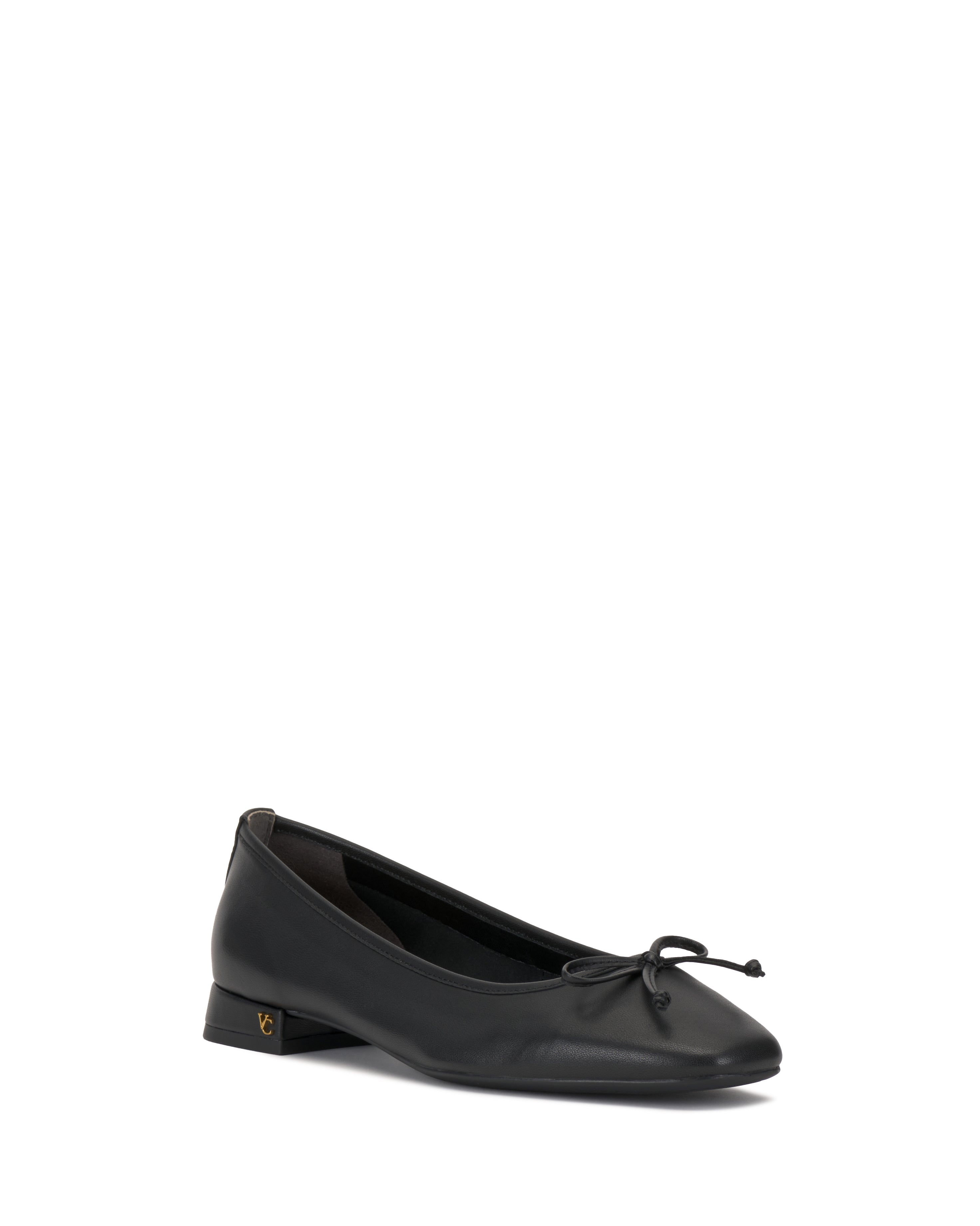 The Vince Camuto Jenlea Ballet Flat is a black leather shoe featuring a small bow on the toe and a low heel, shown against a plain white background.