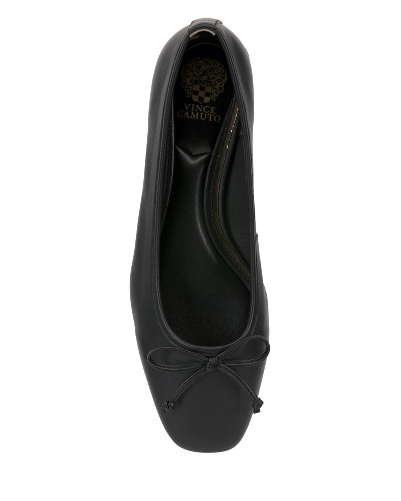Top view of the Vince Camuto Jenlea Ballet Flat in black, featuring a square toe, front bow detail, low block heel, and Vince Camuto branding on the insole.