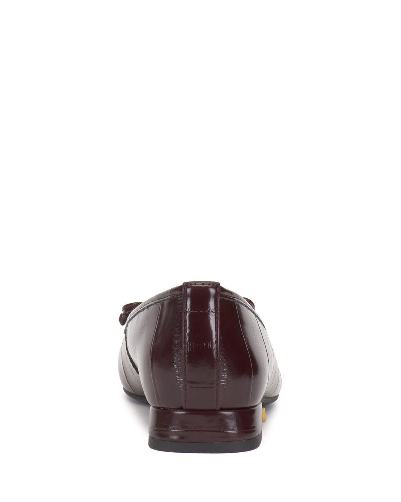 Rear view of a single Jenlea Ballet Flat by Vince Camuto in dark brown leather with a square toe and low block heel, shown against a white background.