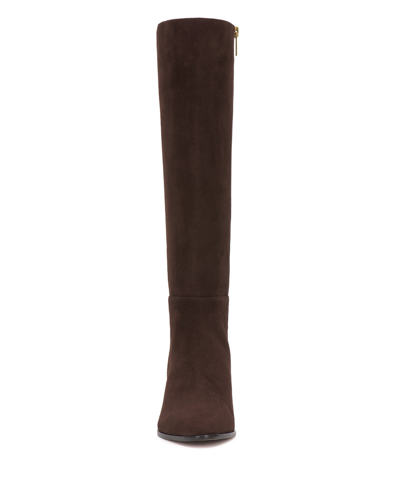Front view of a single Vince Camuto Jorela Narrow Calf Knee High Boot in brown suede, featuring a flat sole and a slightly rounded toe, set against a white background.