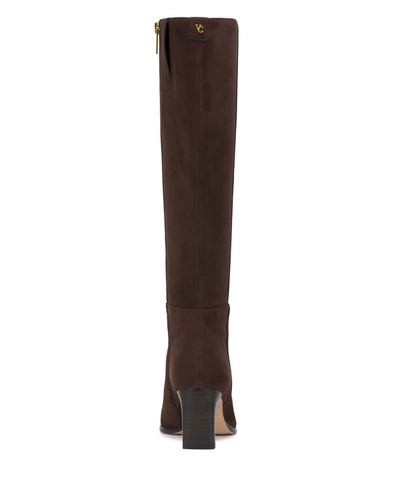 A single Vince Camuto Jorela Wide Calf Knee High Boot in tall brown suede, featuring a block heel and shown from the back. A small gold zipper is visible at the top along with a gold brand logo.