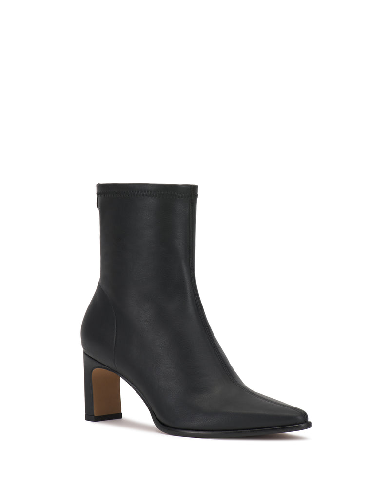 The Julea Bootie by Vince Camuto is a black ankle boot crafted from smooth leather, featuring a pointed toe and a mid-height block heel, displayed on a plain white background.
