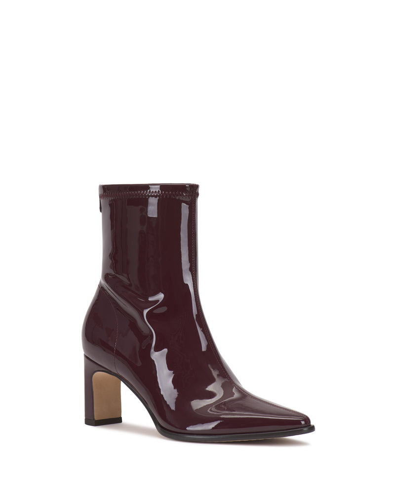 Dark burgundy patent leather Vince Camuto Julea Bootie with a block heel and pointed toe.