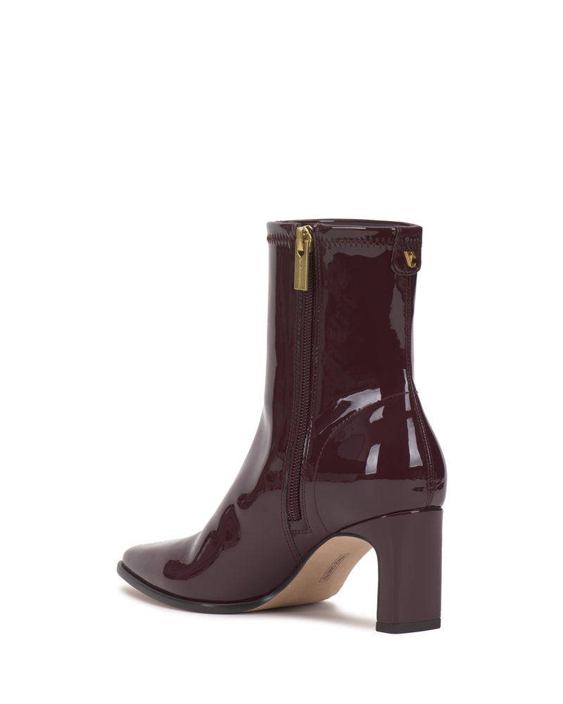 Burgundy patent leather Julea Bootie by Vince Camuto with a side zipper and a block heel.