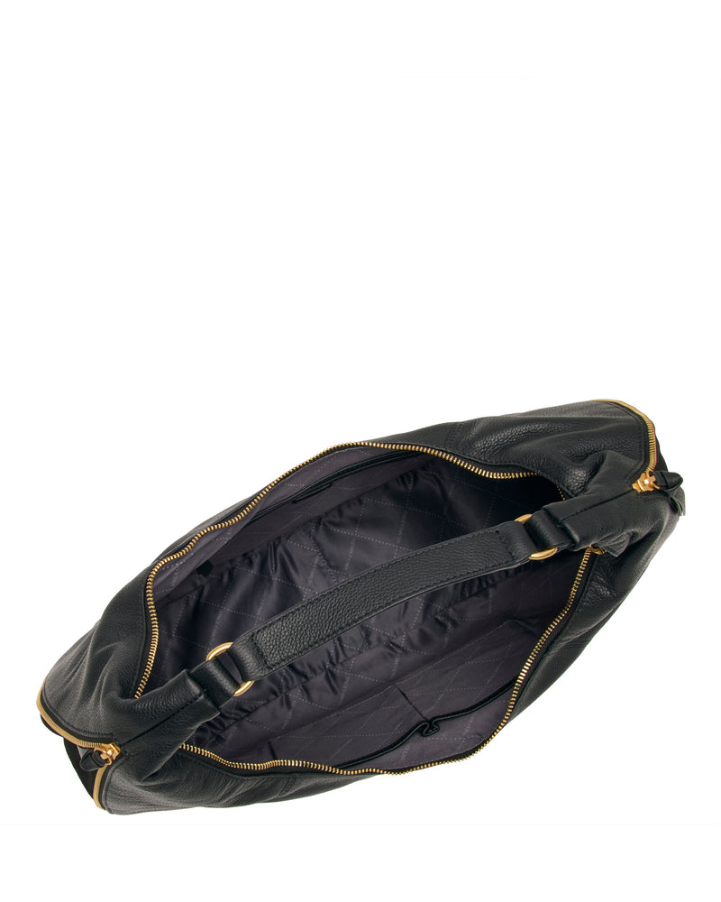 A top view of the Vince Camuto Kaela Hobo Bag, an open black leather shoulder bag with gold zippers, revealing a spacious quilted black interior and inside strap on a white background.