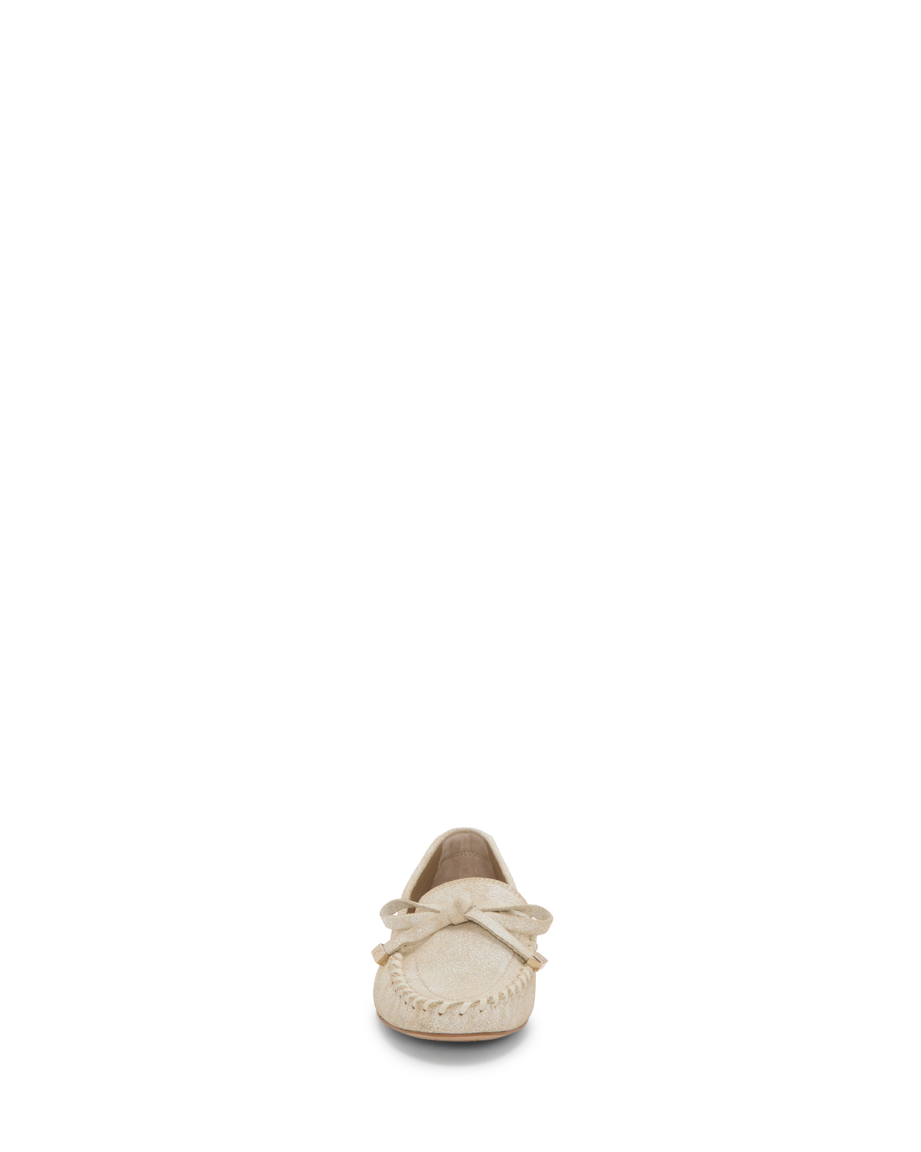 The Vince Camuto Katena Flat Loafer in beige, shown from the front against a white background, features a bow accent and a lightweight moc-inspired silhouette.