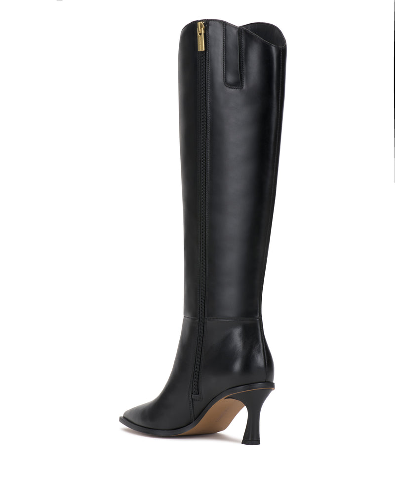 The Vince Camuto Kenlea Extra Wide Calf Knee High Boot, featuring a pointed toe, side zipper, and high heel in black leather, is displayed against a white background.