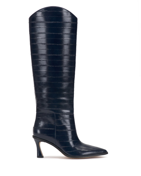 The Vince Camuto Kenlea Extra Wide Calf Knee High Boot stands upright against a white background, featuring a tall silhouette in dark navy with a pointed toe, textured horizontal stripe pattern, and a slightly flared high heel.