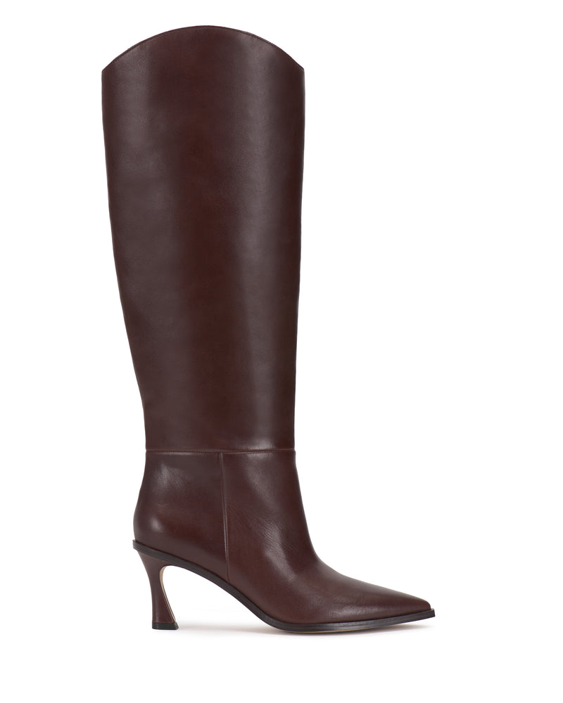 The Vince Camuto Kenlea Knee High Boot, a tall brown leather boot featuring a pointed toe and curved high heel, is shown in profile against a white background.
